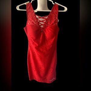 Lady in red mini dress by Guess